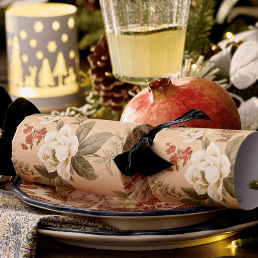 Laura Ashley Dusky Hellebore luxury Christmas crackers, 13" set of 6 with iconic botanical print in pink and sage, velvet bows, and premium quality gifts.