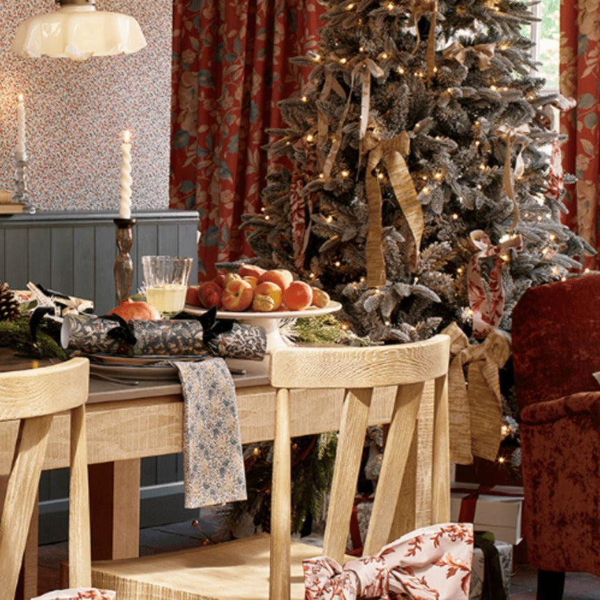 Laura Ashley Dusky Hellebore luxury Christmas crackers, 13" set of 6 with iconic botanical print in pink and sage, velvet bows, and premium quality gifts.